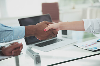 two people shaking hands